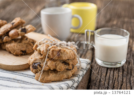 Stack of Chocolate chip cookie and glass of milk Stack of Chocolate chip cookie and glass of milk 13764121
