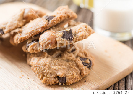 Stack of Chocolate chip cookie and glass of milk Stack of Chocolate chip cookie and glass of milk 13764122