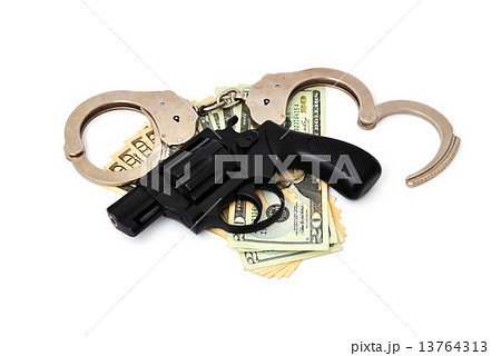 revolver,  dollars and the handcuffs 13764313