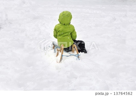 A child on sled 13764562