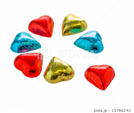 Colorful chocolate hearts on isolated white background Colorful chocolate hearts on isolated white background 13766242