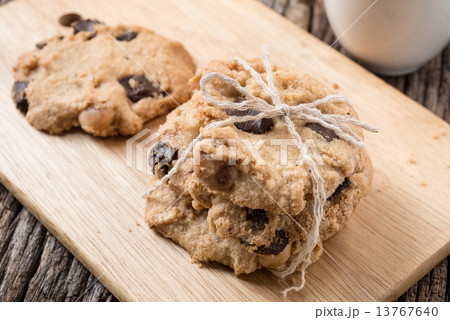 Stack of Chocolate chip cookie and glass of milk Stack of Chocolate chip cookie and glass of milk 13767640