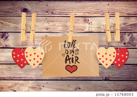 Composite image of love is in the air 13768003