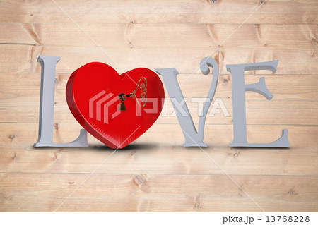 Composite image of love with lock and key Composite image of love with lock and key 13768228