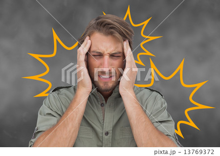 Composite image of man with headache 13769372