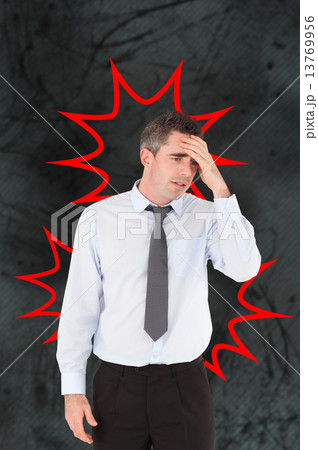 Composite image of man with headache 13769956