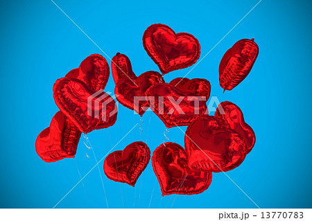 Composite image of heart balloons 13770783