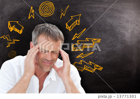 Composite image of man with headache 13771301