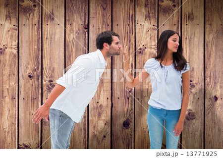 Composite image of brunette uninterested in mans advances 13771925