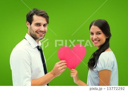 Composite image of pretty brunette giving boyfriend her heart Composite image of pretty brunette giving boyfriend her heart 13772292