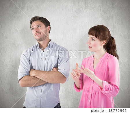 Composite image of woman arguing with uncaring man 13772945