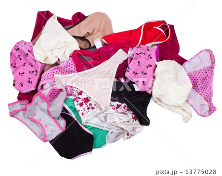 Lots of messy colorful clothes isolated on white 13775028