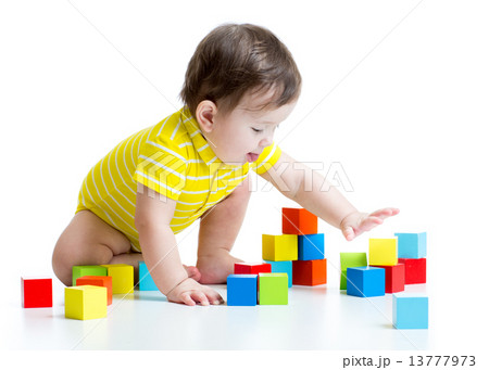 kid boy playing  wooden toys 13777973