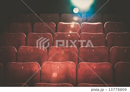 Empty comfortable red seats with numbers in cinema 13778809