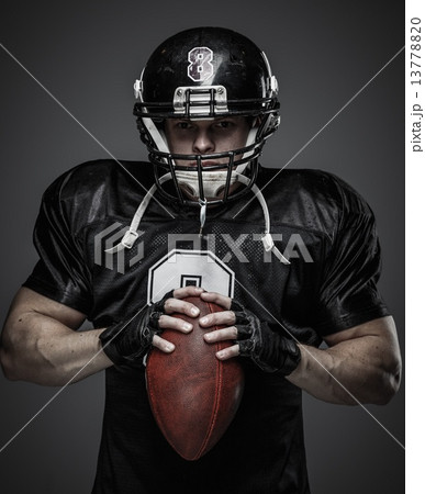 American football player with ball American football player with ball 13778820