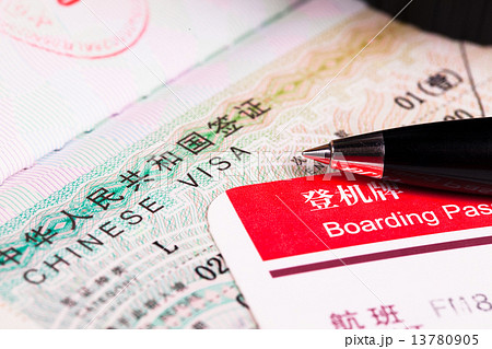China visa in passport and boarding pass China visa in passport and boarding pass 13780905
