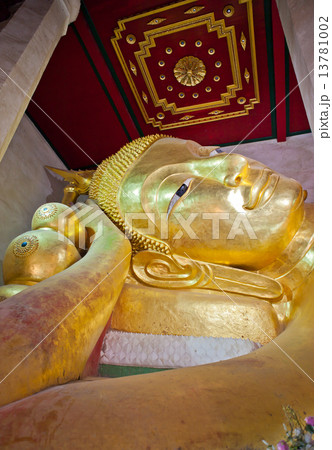 Close up golden reclining Buddha in Thailand Close up golden reclining Buddha in Thailand 13781002
