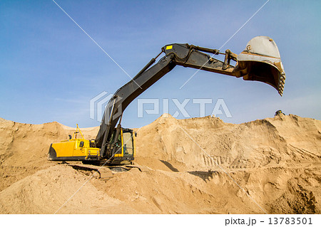 Yellow Excavator at Construction Site 13783501