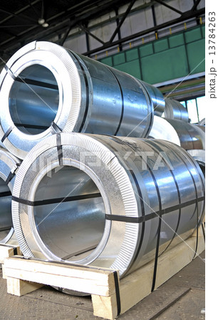 rolls of steel sheet in a warehouse rolls of steel sheet in a warehouse 13784263