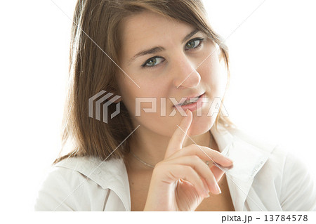 sexy brunette woman holding condom and looking at camera 13784578