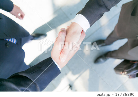 Close up of businessmen shaking hands Close up of businessmen shaking hands 13786890
