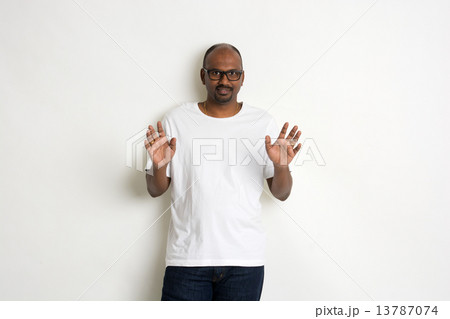 casual indian male shock  look 13787074
