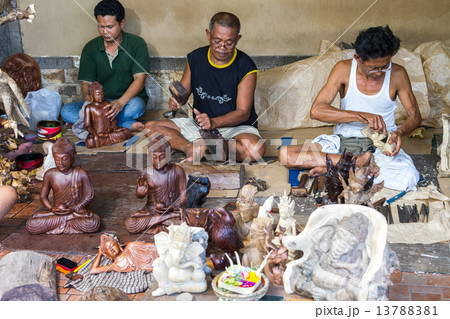 Men are making wooden crafts 13788381