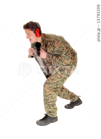 Soldier in camouflage uniform. 13793209