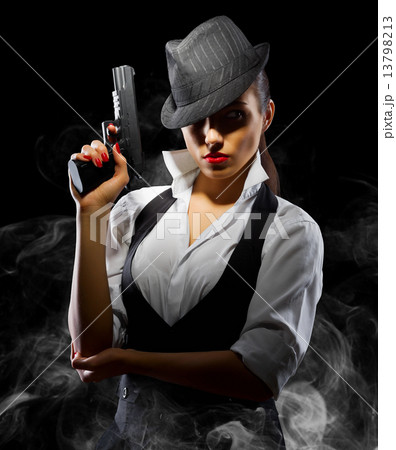 Dangerous and beautiful criminal girl with gun Dangerous and beautiful criminal girl with gun 13798213