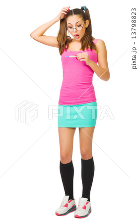 Worried schoolgirl with pregnansy test 13798823