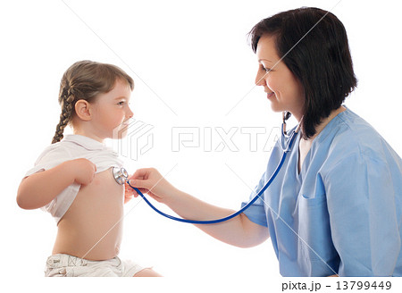 Doctor with stethoscope and little smiling girl 13799449