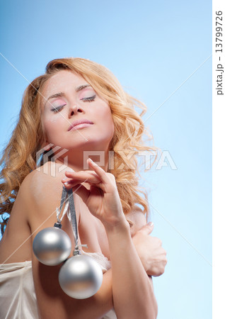 Young beautiful woman with snowy skin Young beautiful woman with snowy skin 13799726