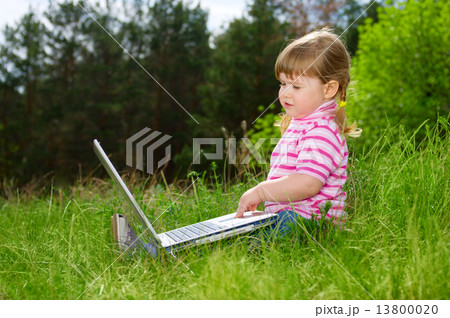 Little girl with laptop Little girl with laptop 13800020