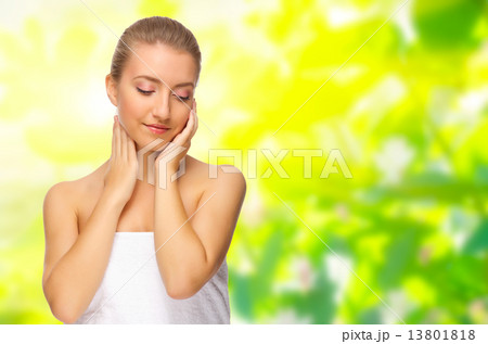 Young healthy woman on spring background 13801818