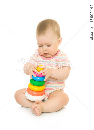 Small baby with toy pyramid 13802145
