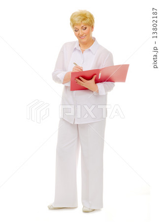 Happy senior woman with notebook 13802187