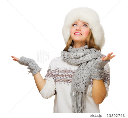 Young girl in sweater 13802748