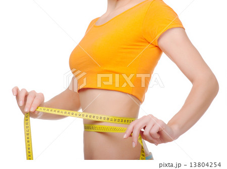 Young woman with centimeter tape 13804254