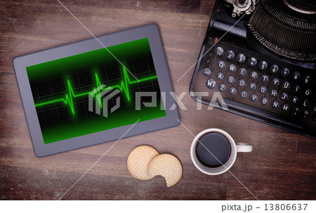 Electrocardiogram on a tablet - Concept of healthcare Electrocardiogram on a tablet - Concept of healthcare 13806637