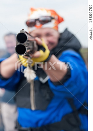 woman aiming a gun woman aiming a gun 13806709