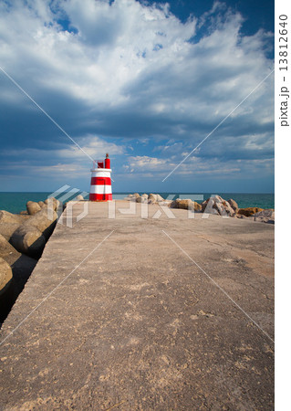 Lighthouse on the Tavira Island before storm, Algarve,Portugal 13812640