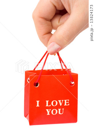 Hand with gift 13824173