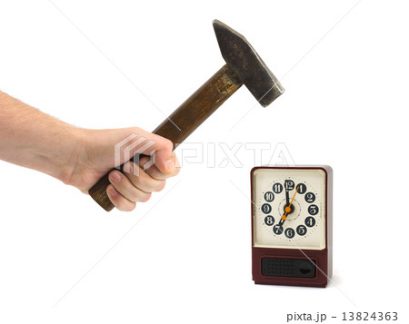 Hand with hammer and alarm clock 13824363