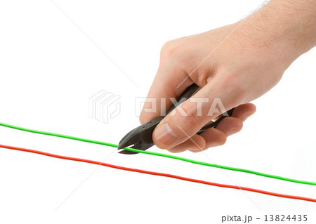 Hand, pliers and cable 13824435