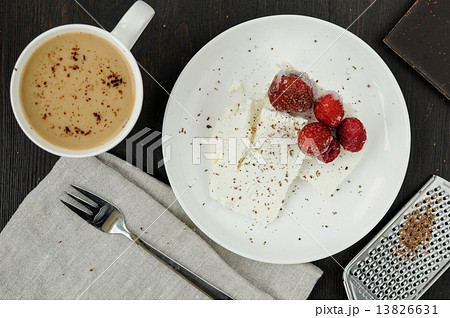 Cottage cheese with fresh berries and coffee with milk for break 13826631