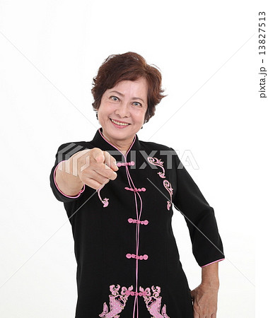 Senior elderly woman pointing happy 13827513