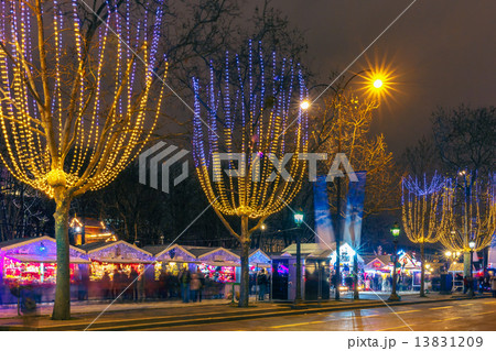 Christmas  market on the Champs Elysees in Paris at night 13831209