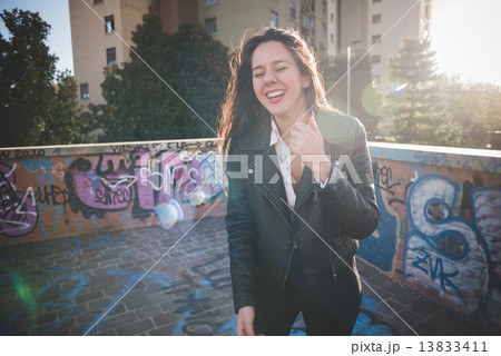 young beautiful long hair woman in town 13833411