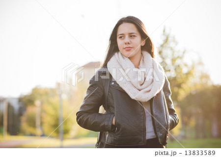 young beautiful long hair woman in town 13833589