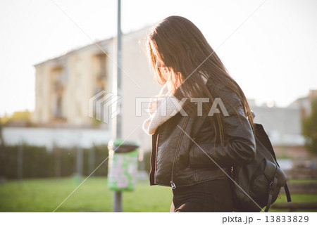 young beautiful long hair woman in town 13833829